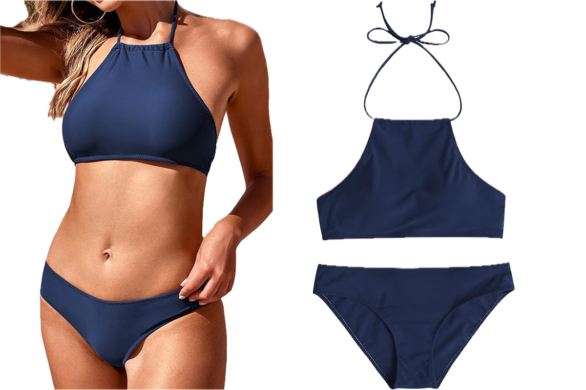 A woman wearing a navy blue, halter style bikini.