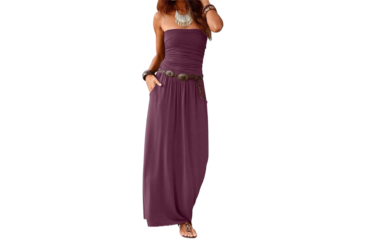 A woman wearing a long, purple, strapless bandeau dress.