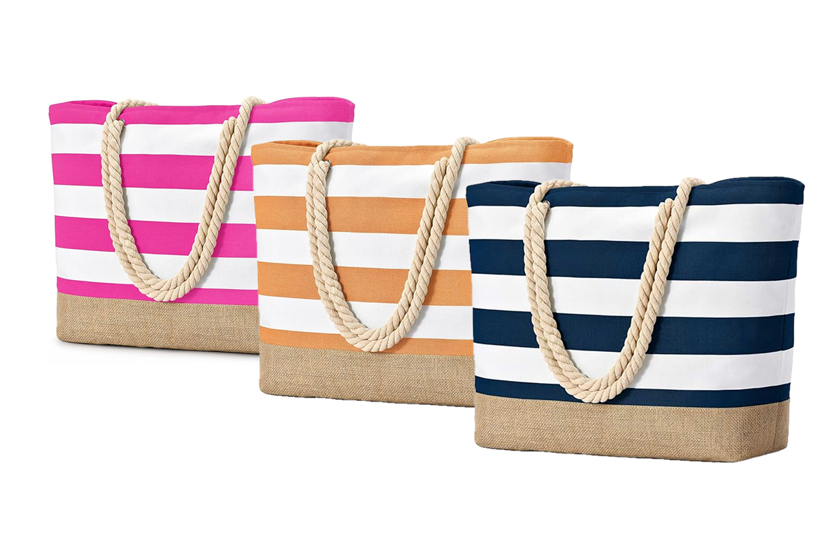 This image features three canvas tote bags: one with pink and white stripes, one with gold and white stripes, and the third with navy blue and white stripes.