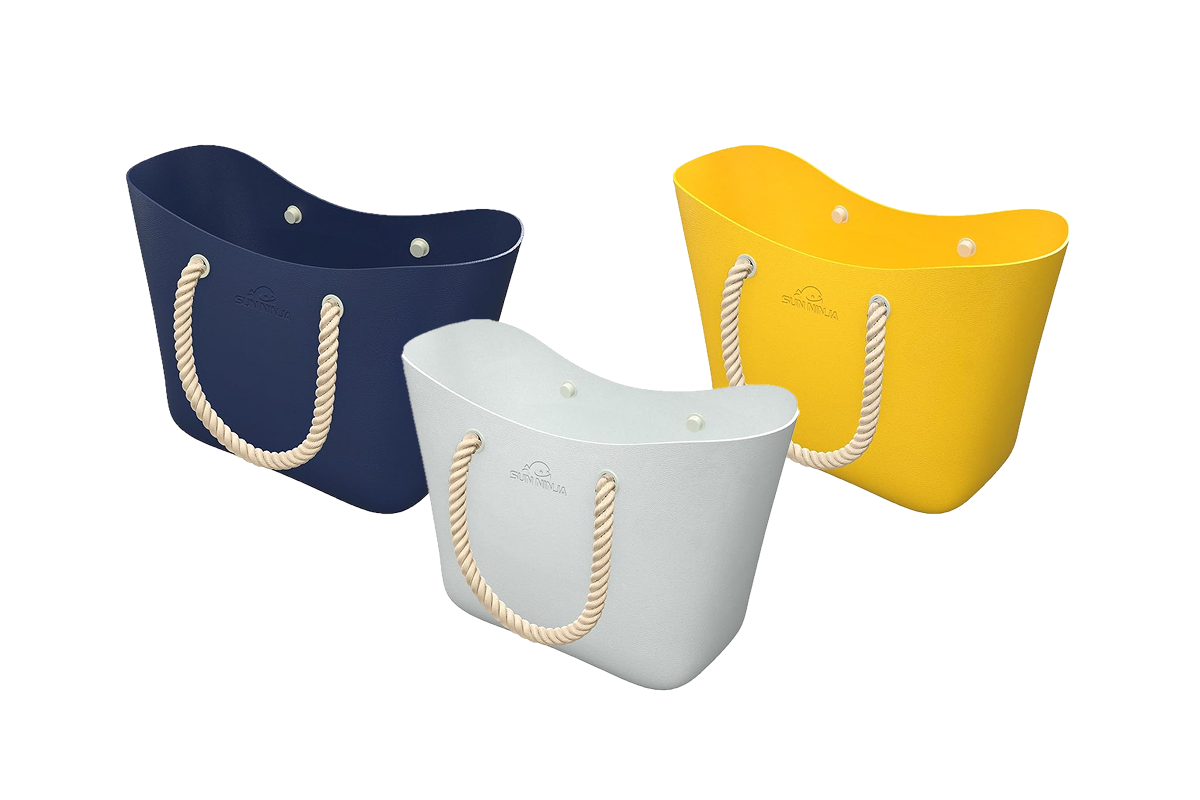 This image features three rubber tote bags in navy blue, white, and bright yellow.