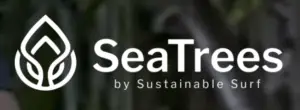 The SeaTrees logo consists of a stylized tree icon and the text "SeaTrees by Sustainable Surf." The tree icon features two leaves with a central stem, resembling an abstract tree. Emphasizing its commitment to reducing the carbon footprint, the logo appears on a blurred green and dark background.