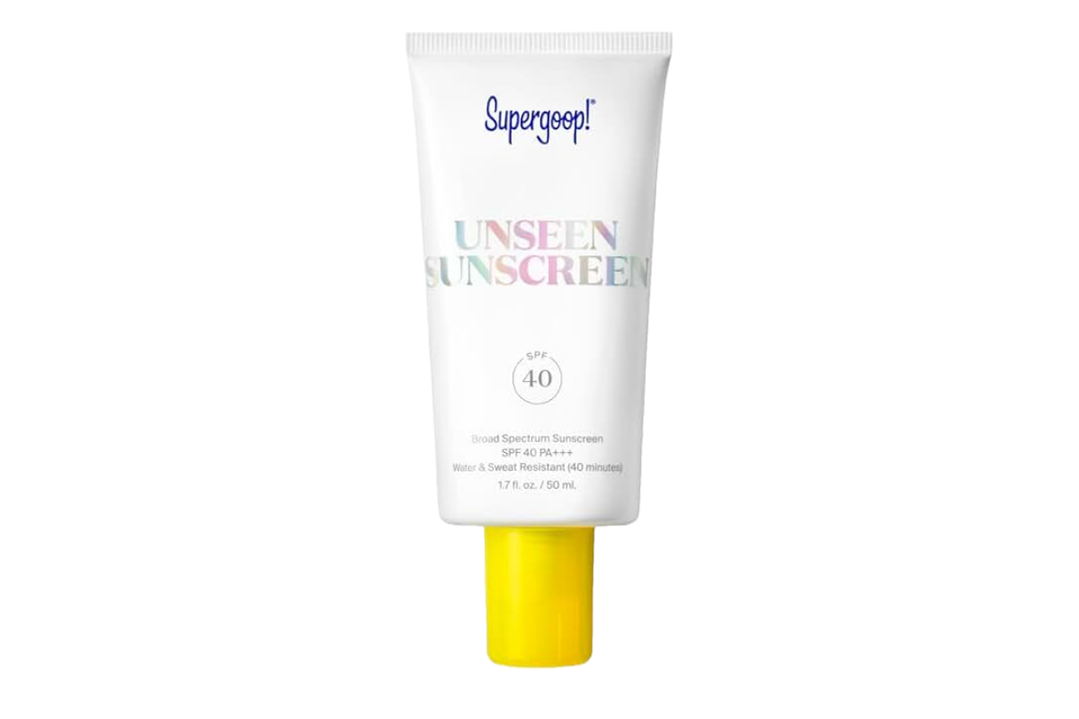 A white tube with rainbow colored font and a bright yellow cap