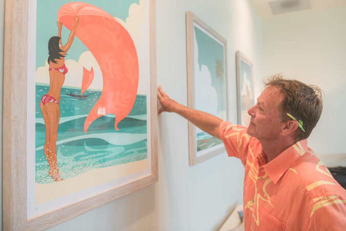 Mike Field views his artwork in Voyager 47 Club Lounge