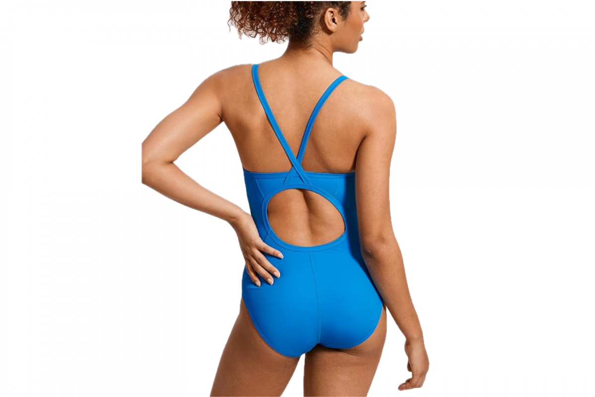 This image features the upper half of a woman's body, back facing, wearing a blue one piece bathing suit with thin straps, a full bottom and a round cutout mid back