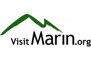marin-cvb-Logo A simple green mountain graphic with the text "Visit Marin.org" in black font. The mountain graphic sits above the text in a stylized, minimalist design, capturing the essence of Marin County.
